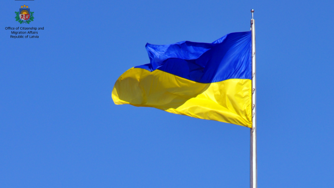 Ukrainian flag with Ocma logo in English