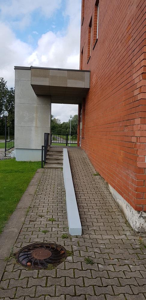 entrance to the building with ramp
