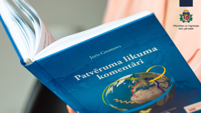 atvērta grāmata "patvēruma likuma komentāri"